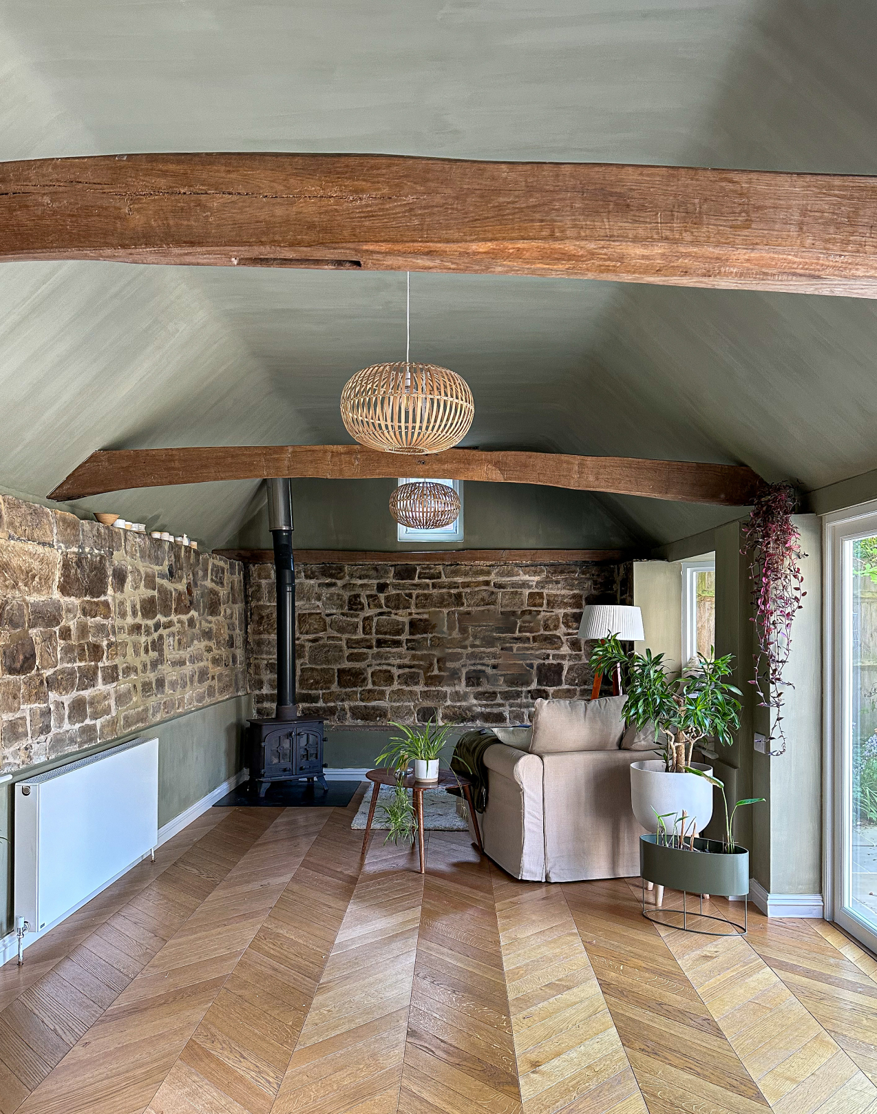 Image of chest of drawers with a lamp and painting on the wall,
                        neat and presentable.